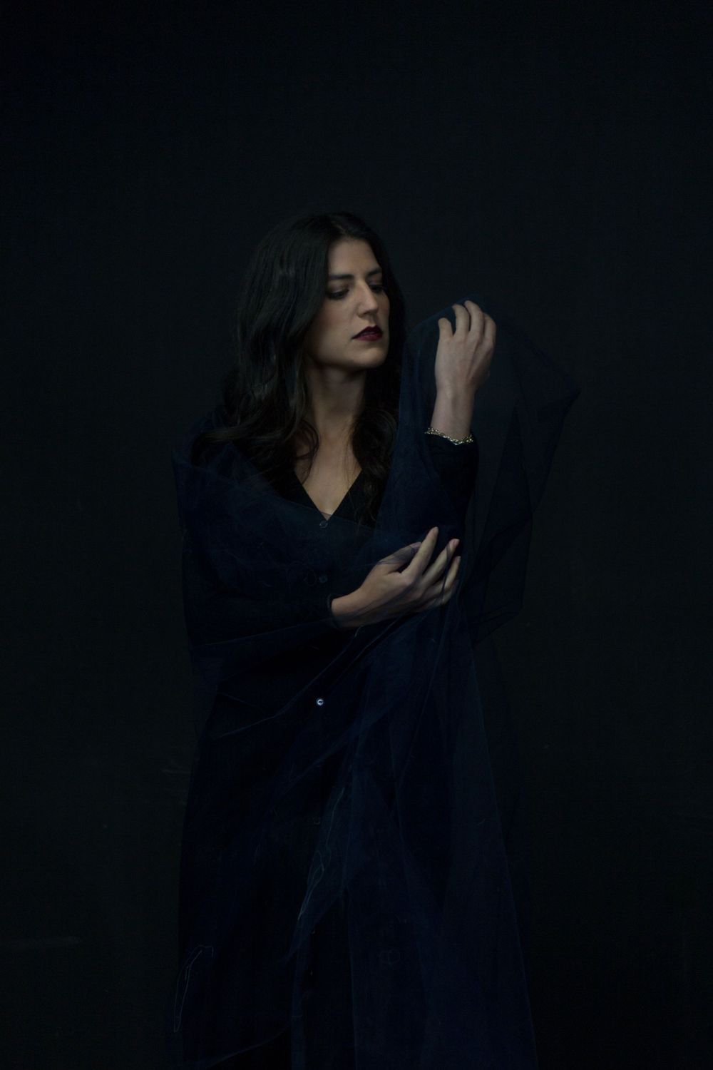No Name Collective, Macbeth Theatre production promo photography. Dark, low lit moody image of Annaliese Kirby.