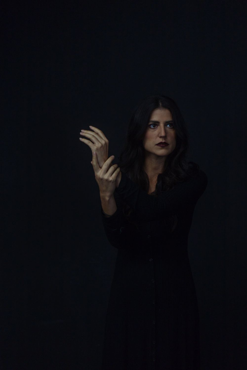 No Name Collective, Macbeth Theatre production promo photography. Dark, low lit moody image of Annaliese Kirby.