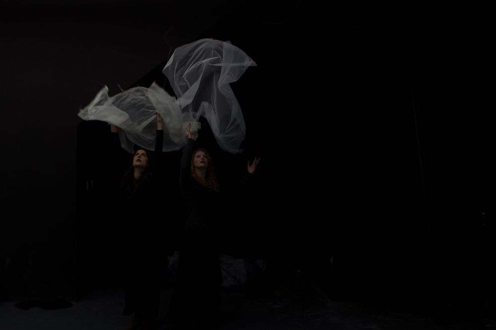 No Name Collective, Macbeth Theatre production promo photography. Dark, low lit moody image of Annaliese Kirby and Maggie Hood.