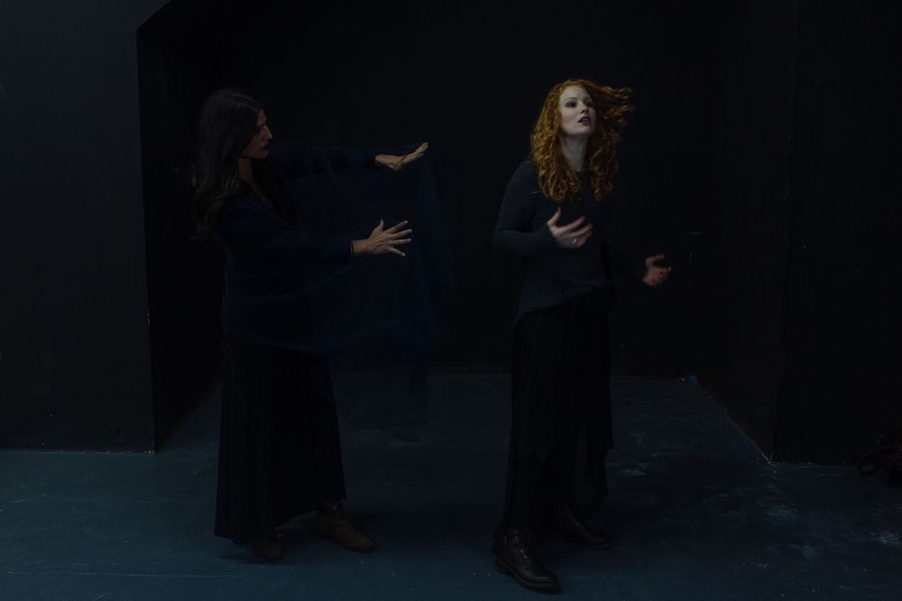 No Name Collective, Macbeth Theatre production promo photography. Dark, low lit moody image of Annaliese Kirby and Maggie Hood.