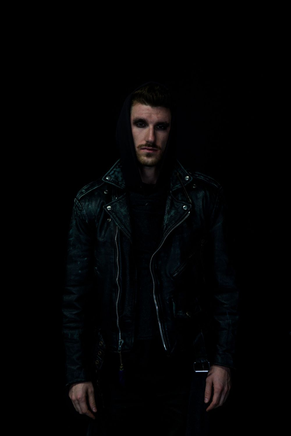 No Name Collective, Macbeth Theatre production promo photography. Dark, low lit moody image of actor looking ahead Jenny Catlow Photography