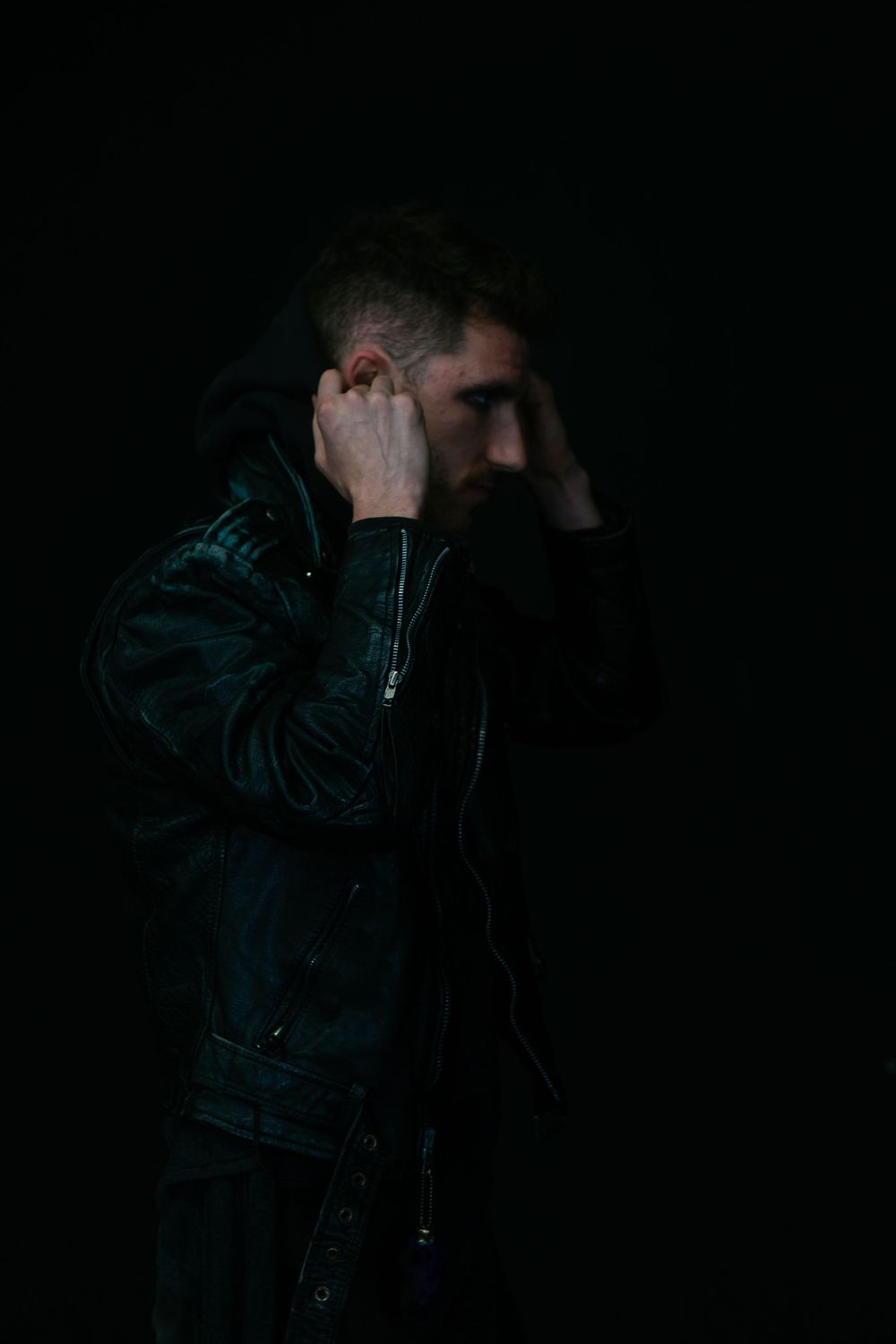 No Name Collective, Macbeth Theatre production promo photography. Dark, low lit moody image of actor looking away Jenny Catlow Photography