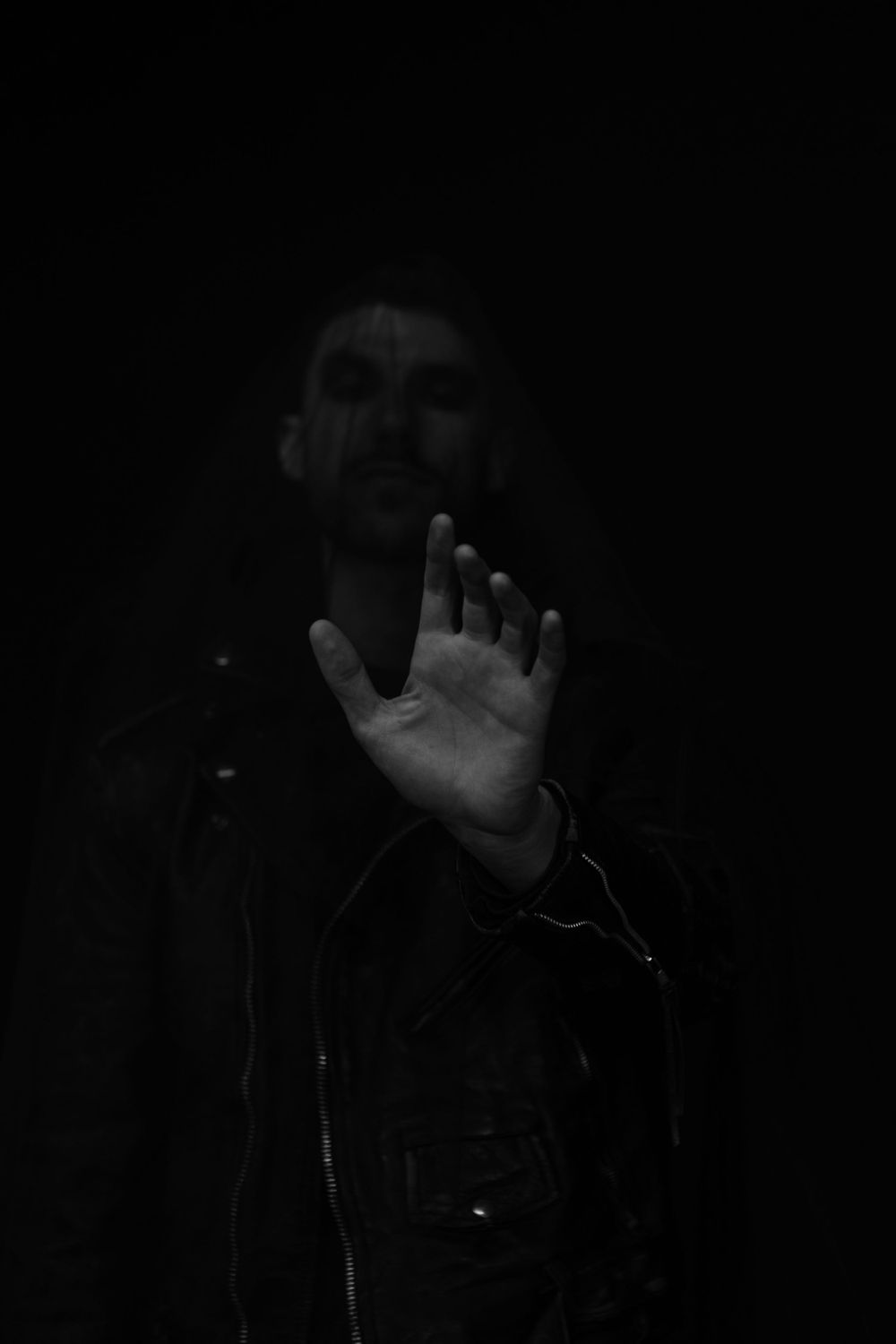 No Name Collective, Macbeth Theatre production promo photography. Dark, low lit moody image of actor with hand out. Jenny Catlow Photography