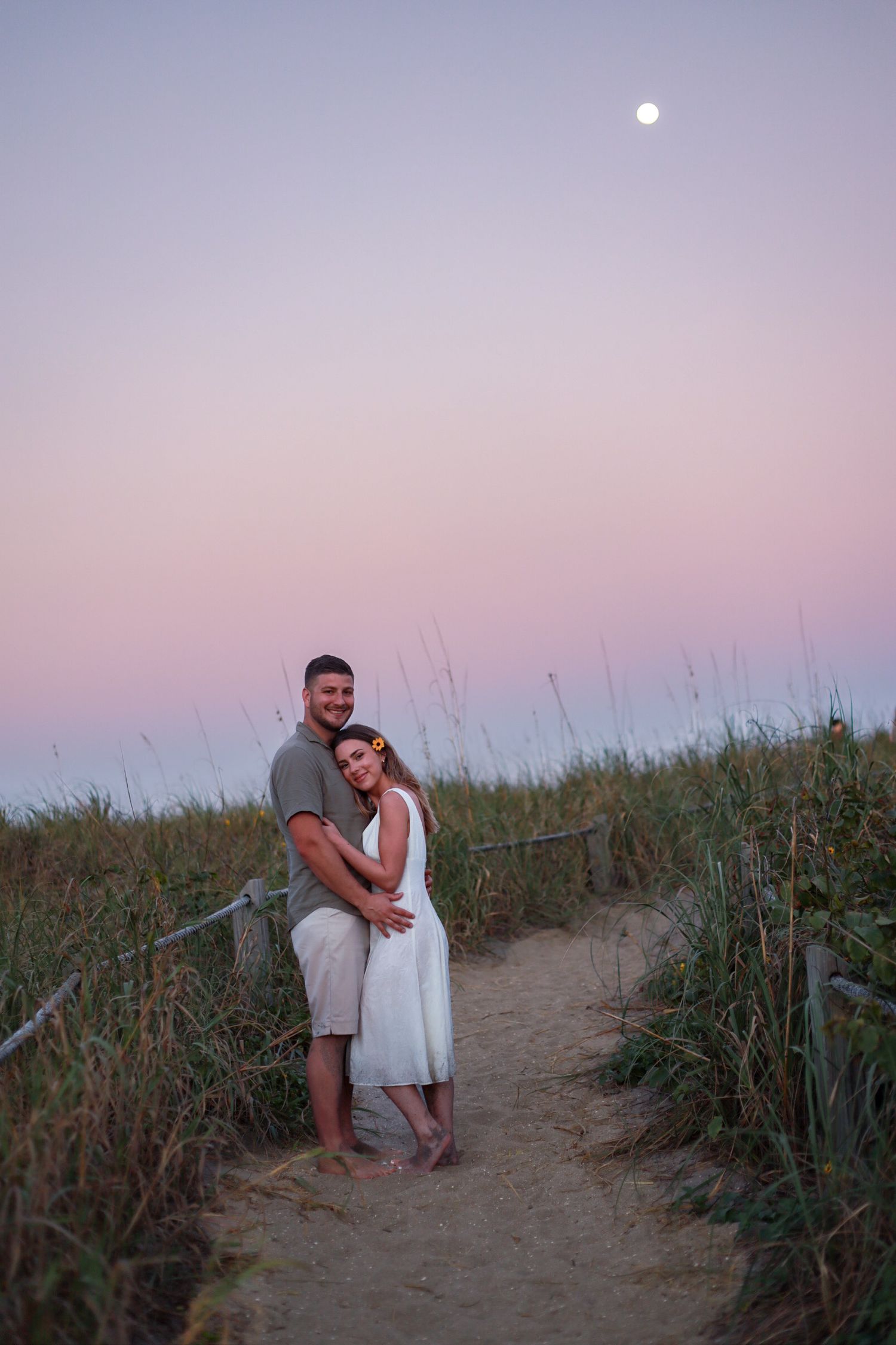 Fort Pierce Florida romantic beach couples session at sunset on Hutchinson Island with ocean views and coastal dunes
