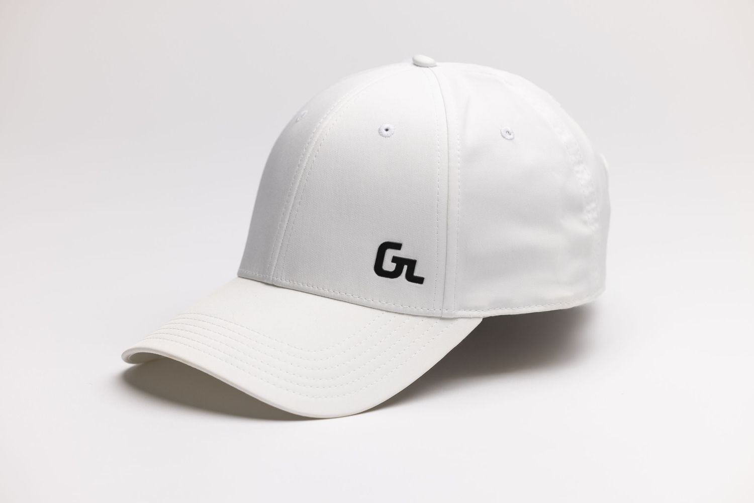 A white baseball cap shown from multiple angles on a light gray background.