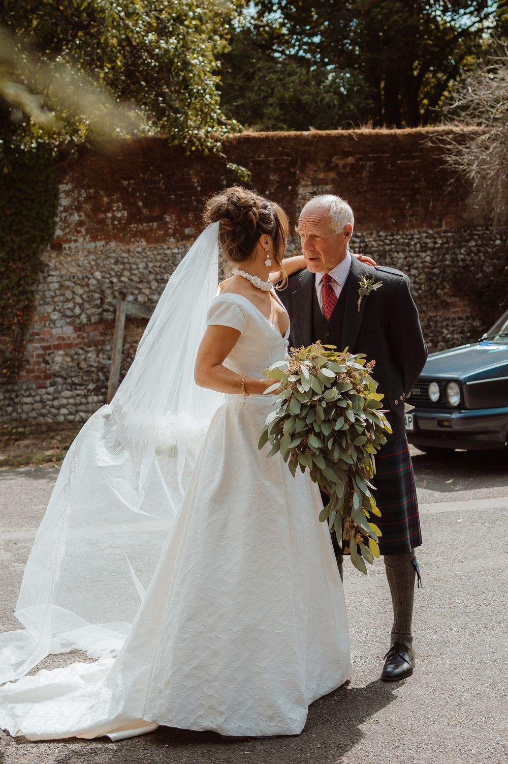 A romantic wedding moment captured in a series of photos showing a couple in formal attire against a brick wall backdrop.