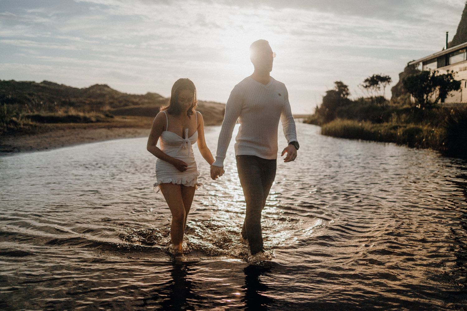 A newly wed couple in Karekare Beach for their couple shoot with Apertured Media-Auckland Wedding Photographer