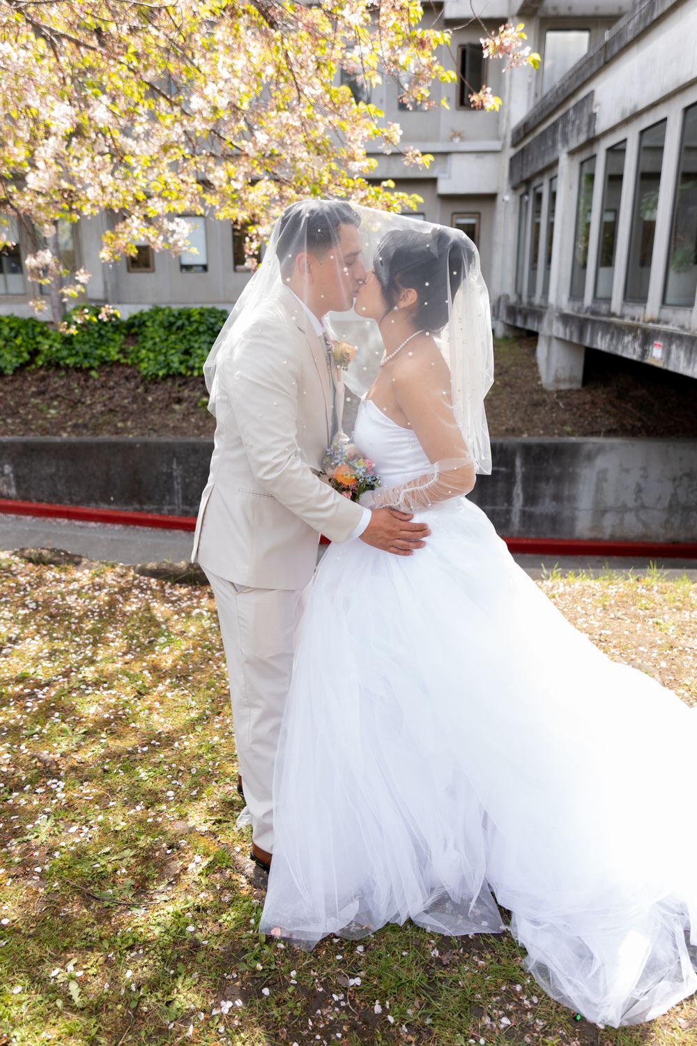 A series of wedding photos capturing tender moments between newlyweds in a garden setting with fall colors.