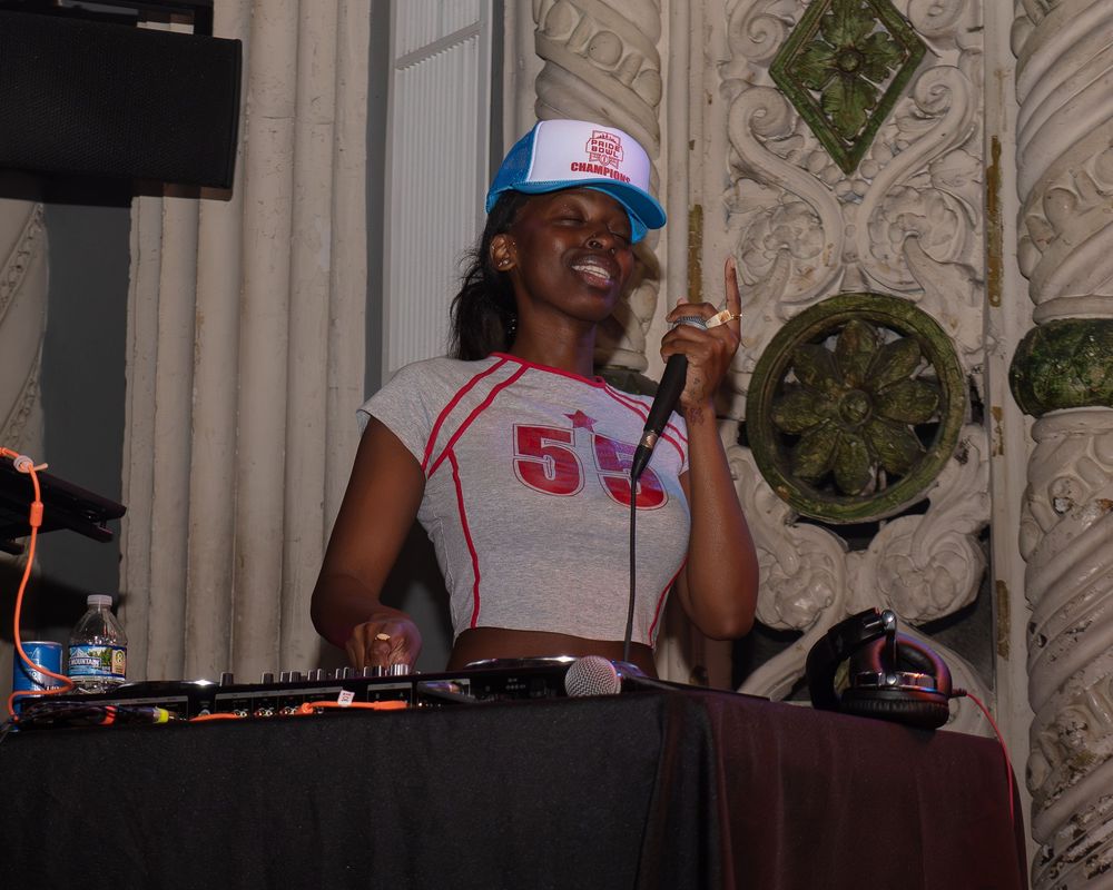 DJ Suki Geez dances at Pride Bowl hosted by the National Gay Flag Football League celebrate at the closing party at Metro in C