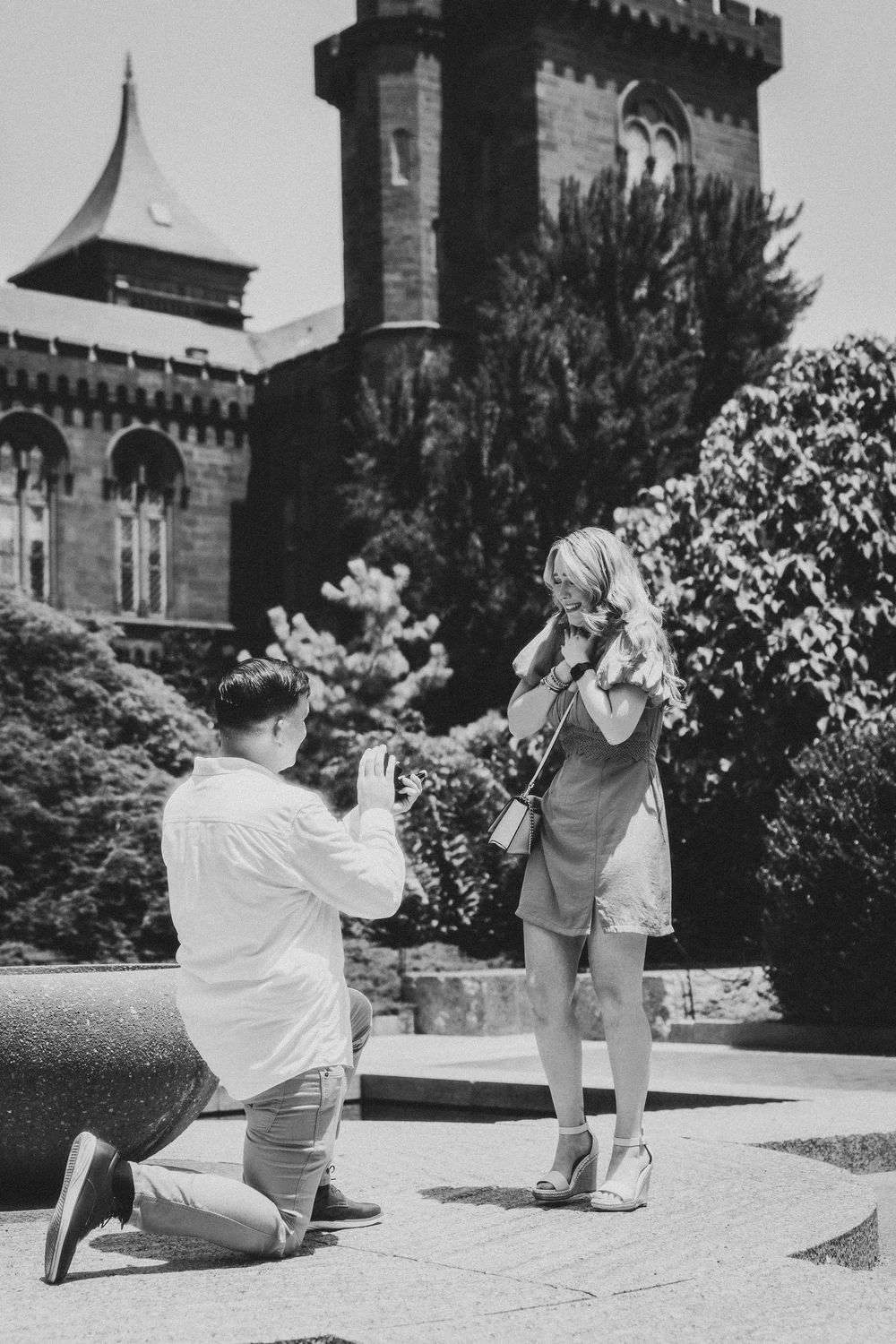 A sequence of vintage black and white photographs showing two people dancing together on a sunny day outside the Enid Haupt building