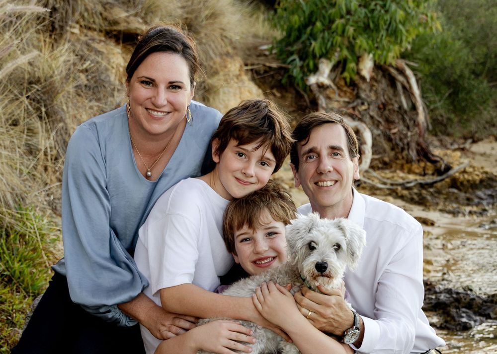 Family portrait by the Swan River in East Fremantle with the family dog.