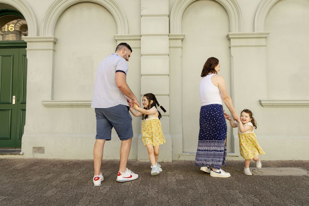 Family portrait photography in Fremantle with old architecture.