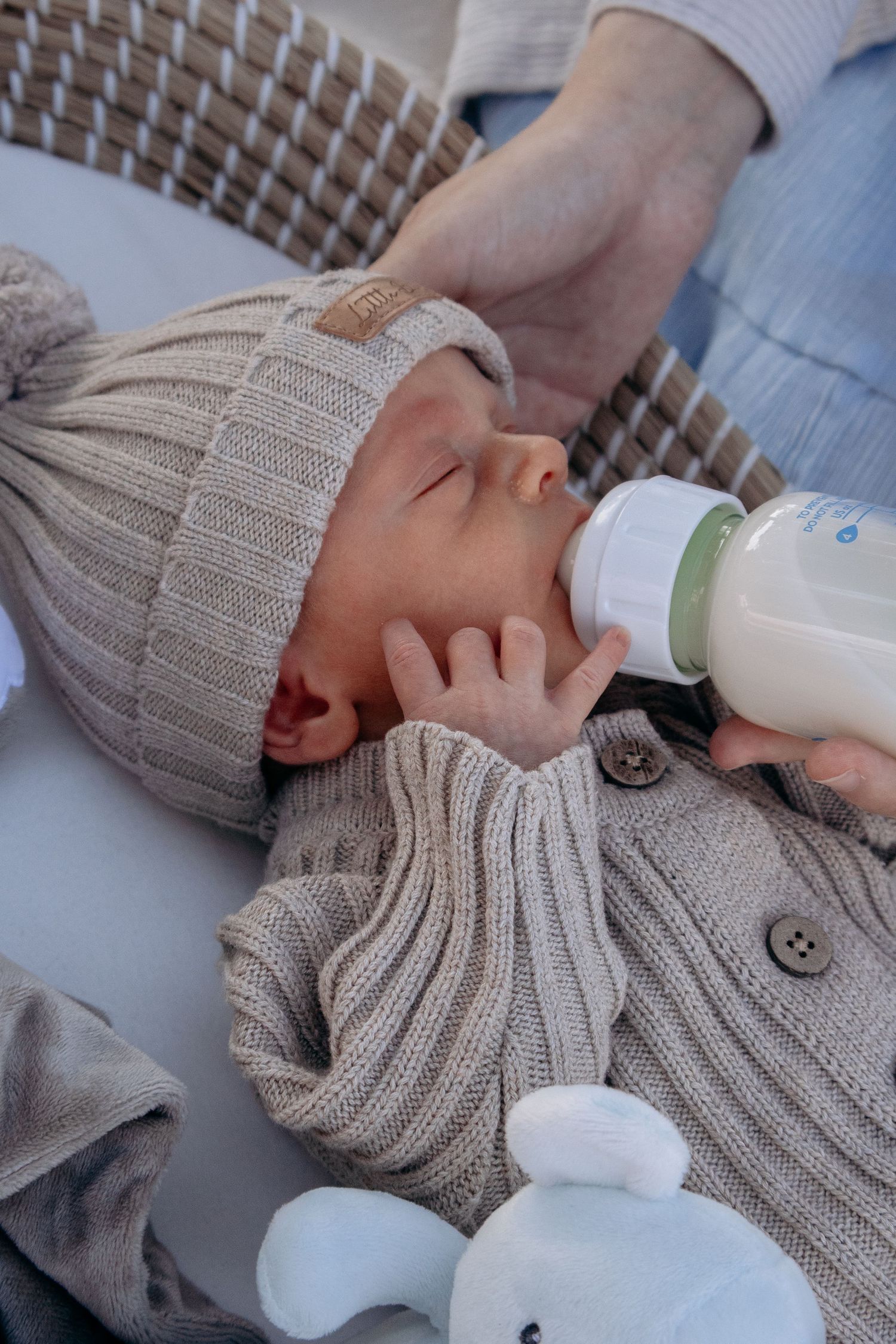 Relaxed lifestyle newborn photography telling the story of life with a new baby, just as it is.