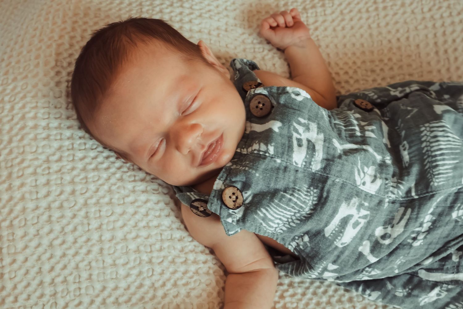 Relaxed lifestyle newborn photography telling the story of life with a new baby, just as it is.