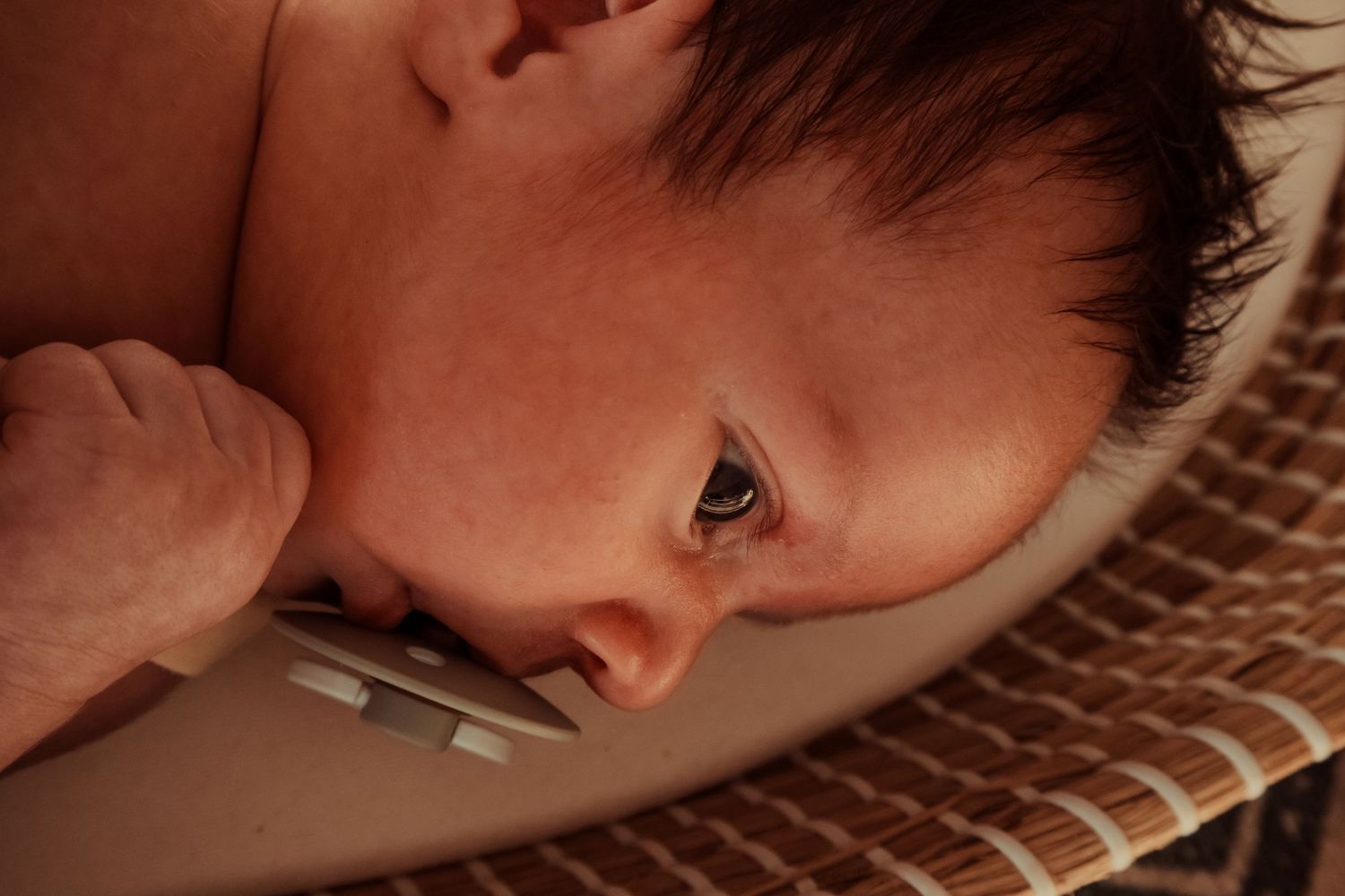 Relaxed lifestyle newborn photography telling the story of life with a new baby, just as it is.