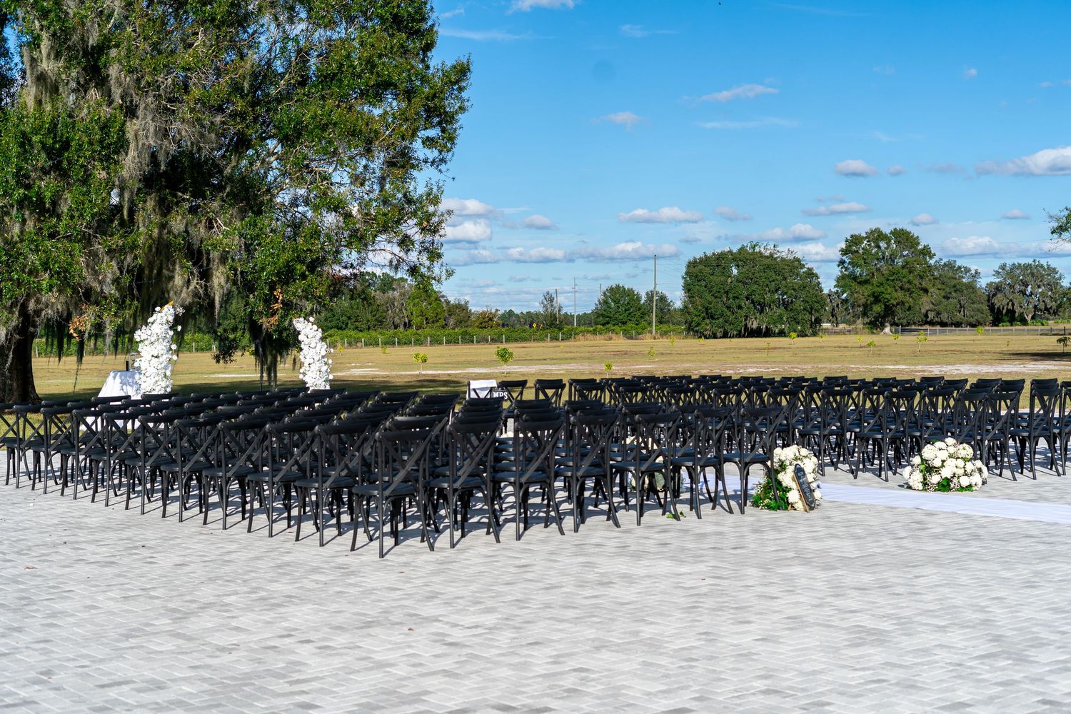 South Florida wedding photographers captured the ceremony area at Scars Farm, a luxury wedding event venue in Bartow, Florida.