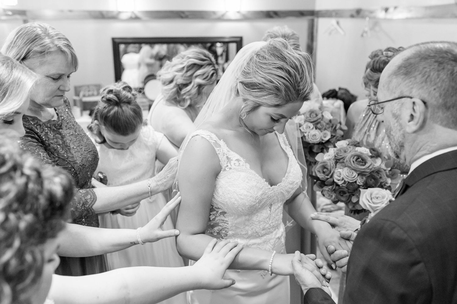 praying over the bride before the wedding from Blue Ridge wedding photographers
