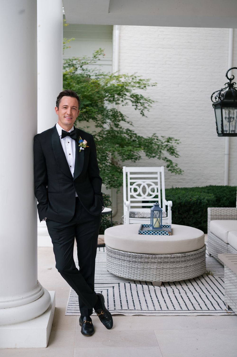 A sequence of formal wedding photos showing someone in a black tuxedo sitting on white columns of a classic porch.