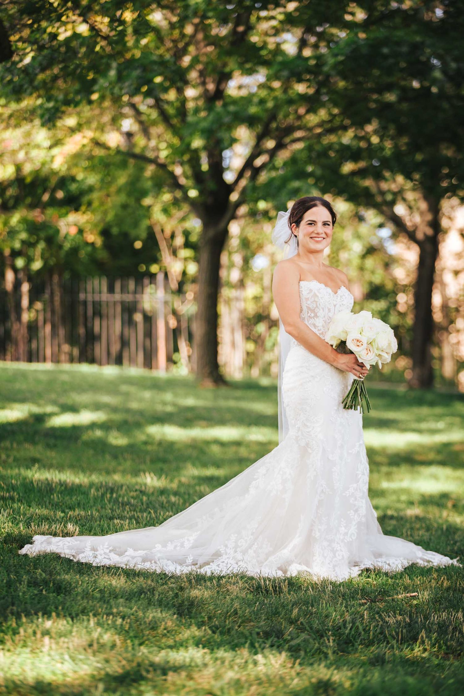 Bride holding her bouquet during wedding portraits at Dorchester Heights in South Boston