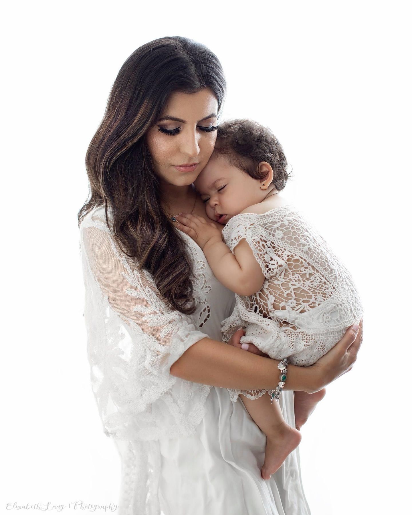 A sequence of tender moments captured in white showing intimate maternal bonding against a light background.