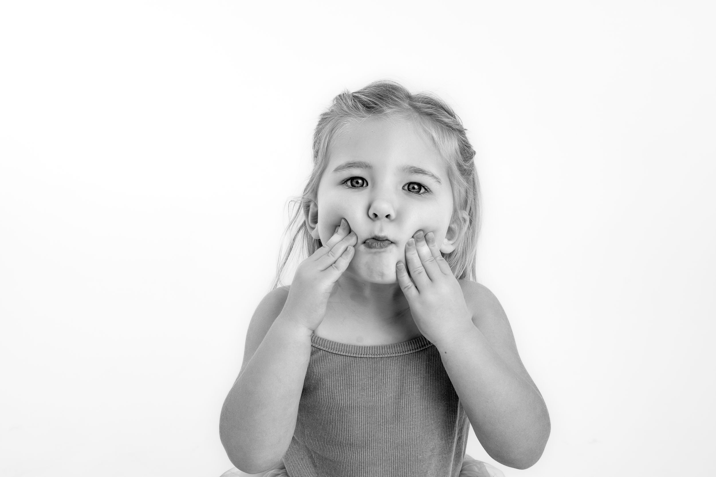 Four sequential photos showing playful expressions and silly faces against a white background.