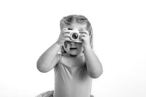 Series of playful expressions and poses in black and white for personality portrait mini session