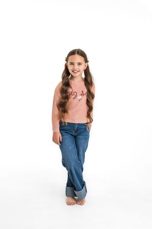 Child in pink top and jeans shown in playful walking poses against white background.