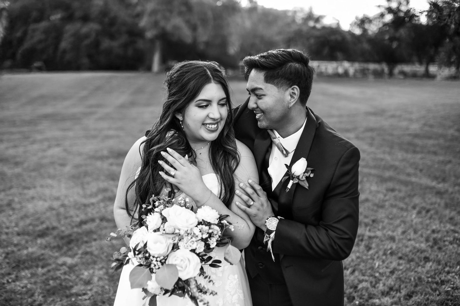 Candid laughter shared between bride and groom