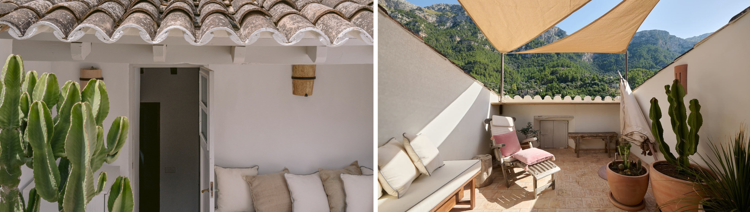 A charming Mediterranean villa exterior showcases terracotta roof tiles, white stucco walls and lush greenery in the garden.