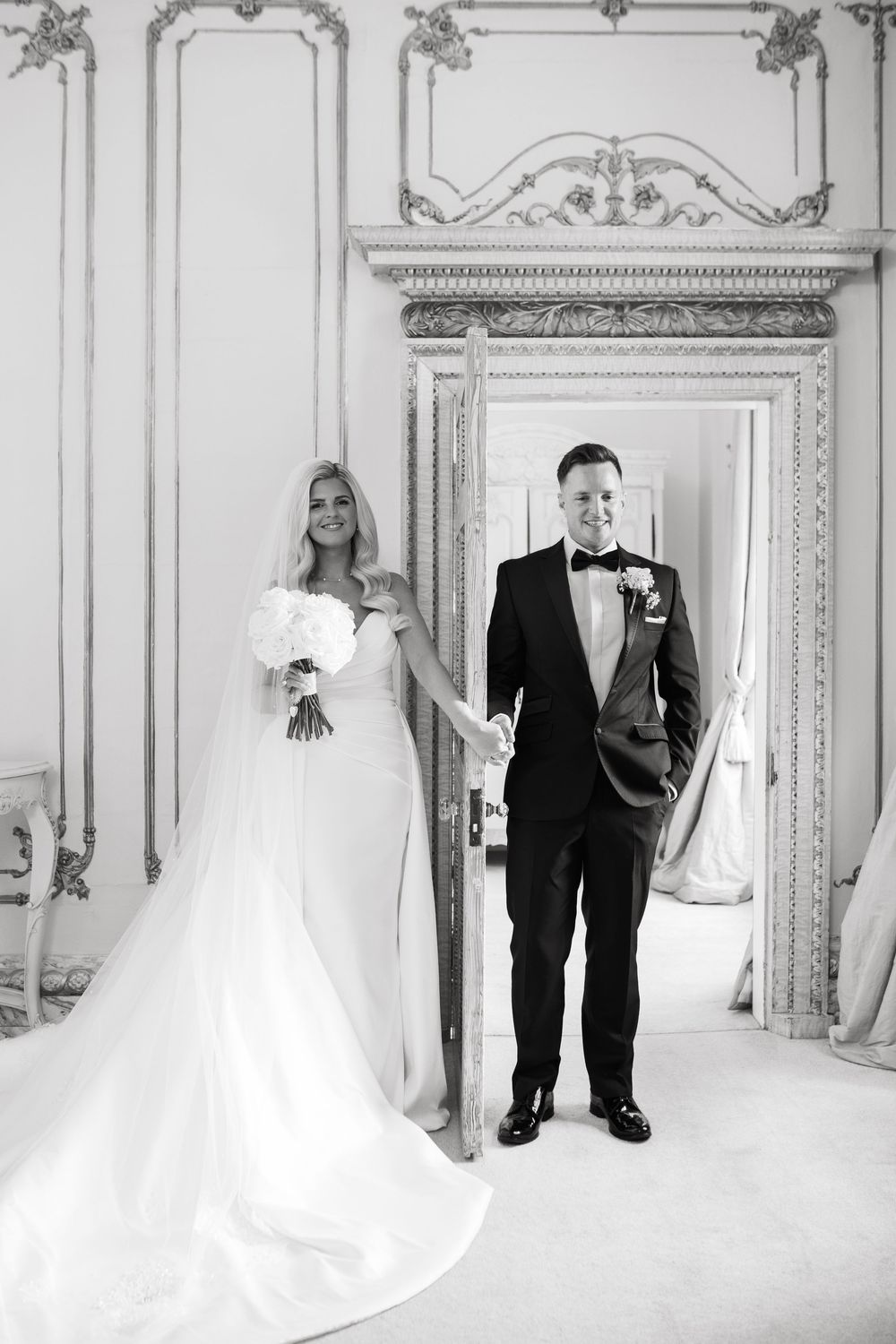 A series of elegant black and white wedding photos showing couples in formal attire against ornate white walls.