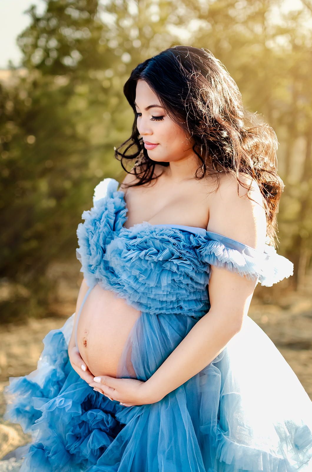 Denver maternity photography session at sunset in Castlewood Canyon Park in Castle Rock, Colorado.