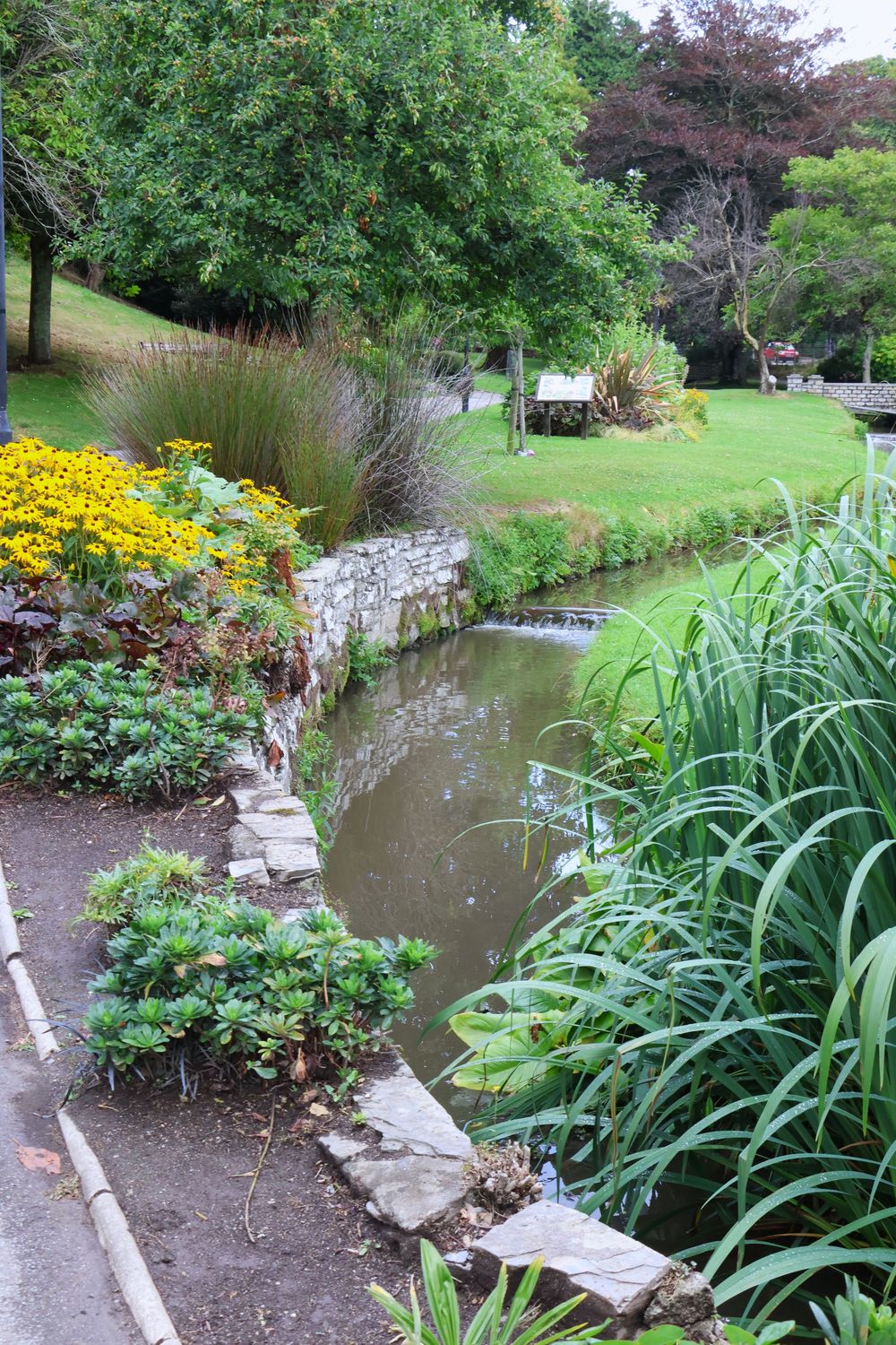 Full color photograph of a garden/park in Newquay, England