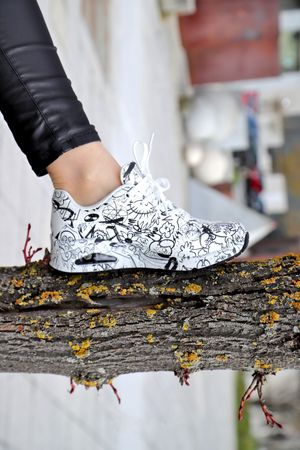 Urban fashion photography, shoes product photo with a female model, lifestyle photographer in Spain, Germany, France
