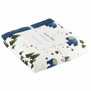 Folded baby blanket with blue bears and trees soft 4-layer muslin, styled for product display, Amazon photo, catalogue photography, Italy