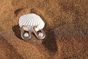 fotografía de joyería en la playa
