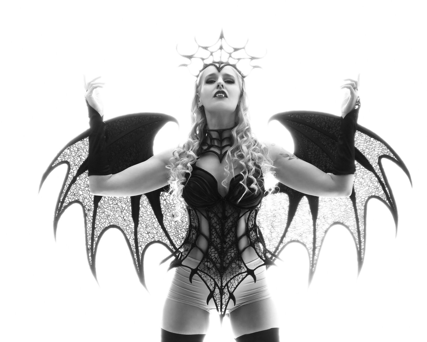 David G Holt Photography - Dark dramatic photo sequence with flowing fabric and artistic poses in noir style.