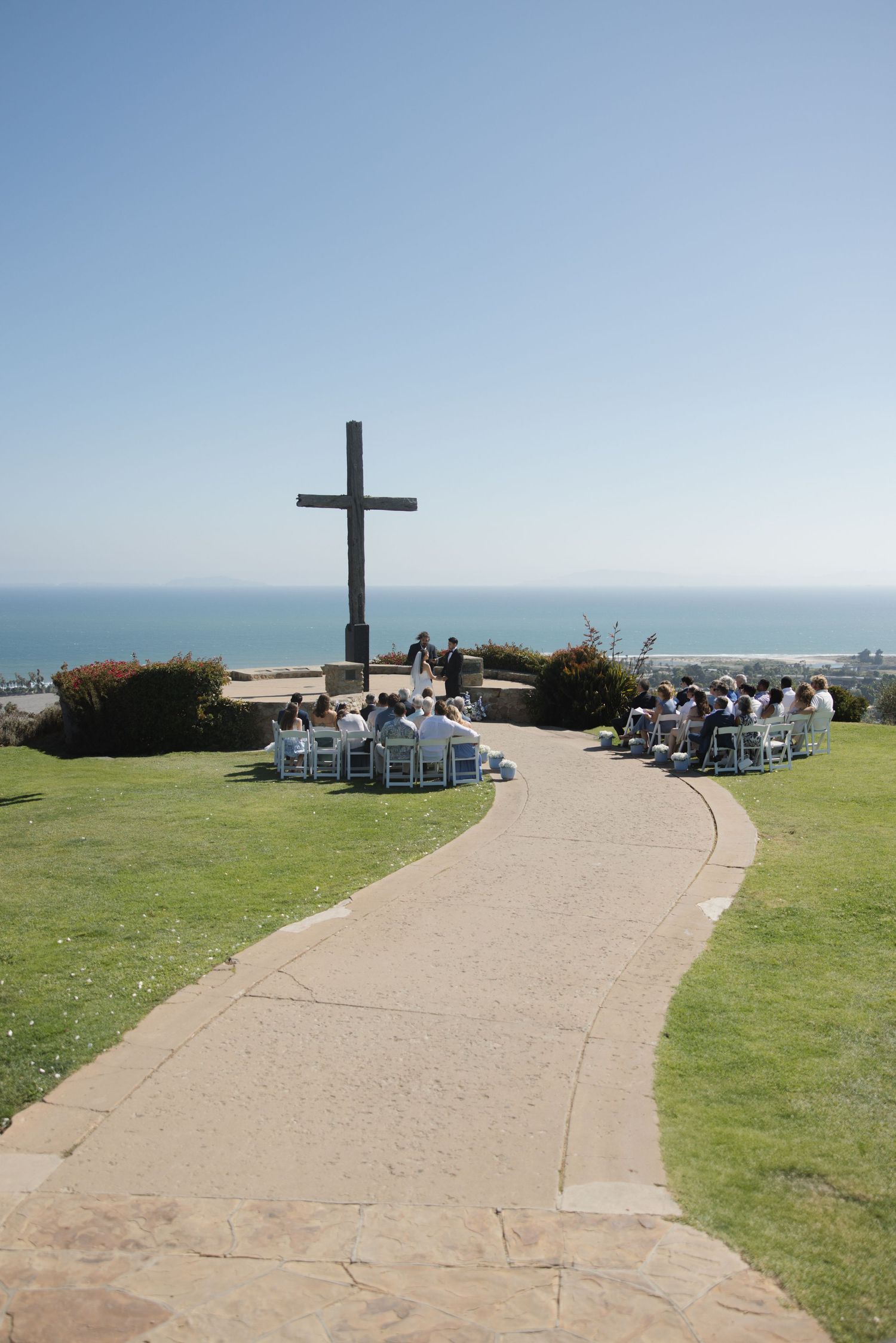 Wide shot of wedding ceremony setup at Serra Cross in Ventura overlooking the ocean