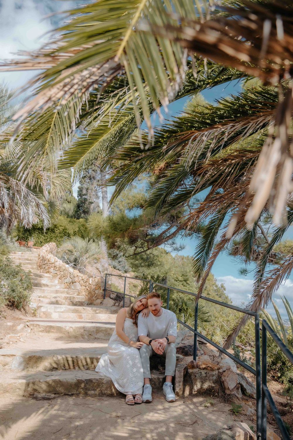 Romantic kiss in front of the Templet de Linné overlooking the Mediterranean.