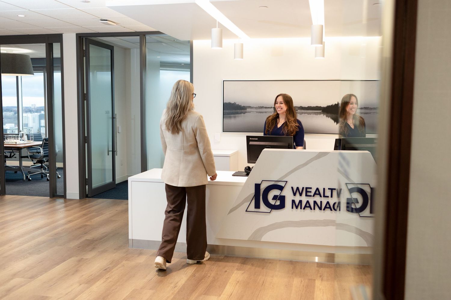 Difference between headshots and branding photography for business featuring IG wealth management in London Ontario