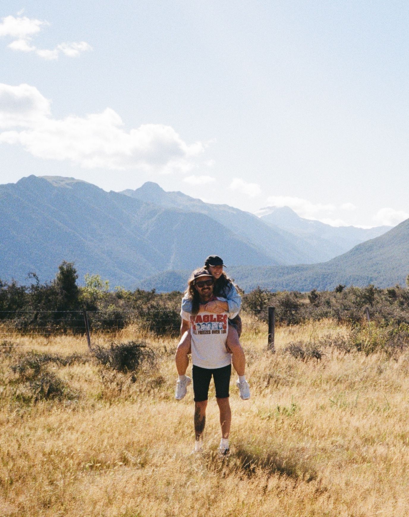 Fun, laidback couple traveling near Arthur's Pass. Howdy Pictures - we are film wedding and elopement photographer in New Zealand.