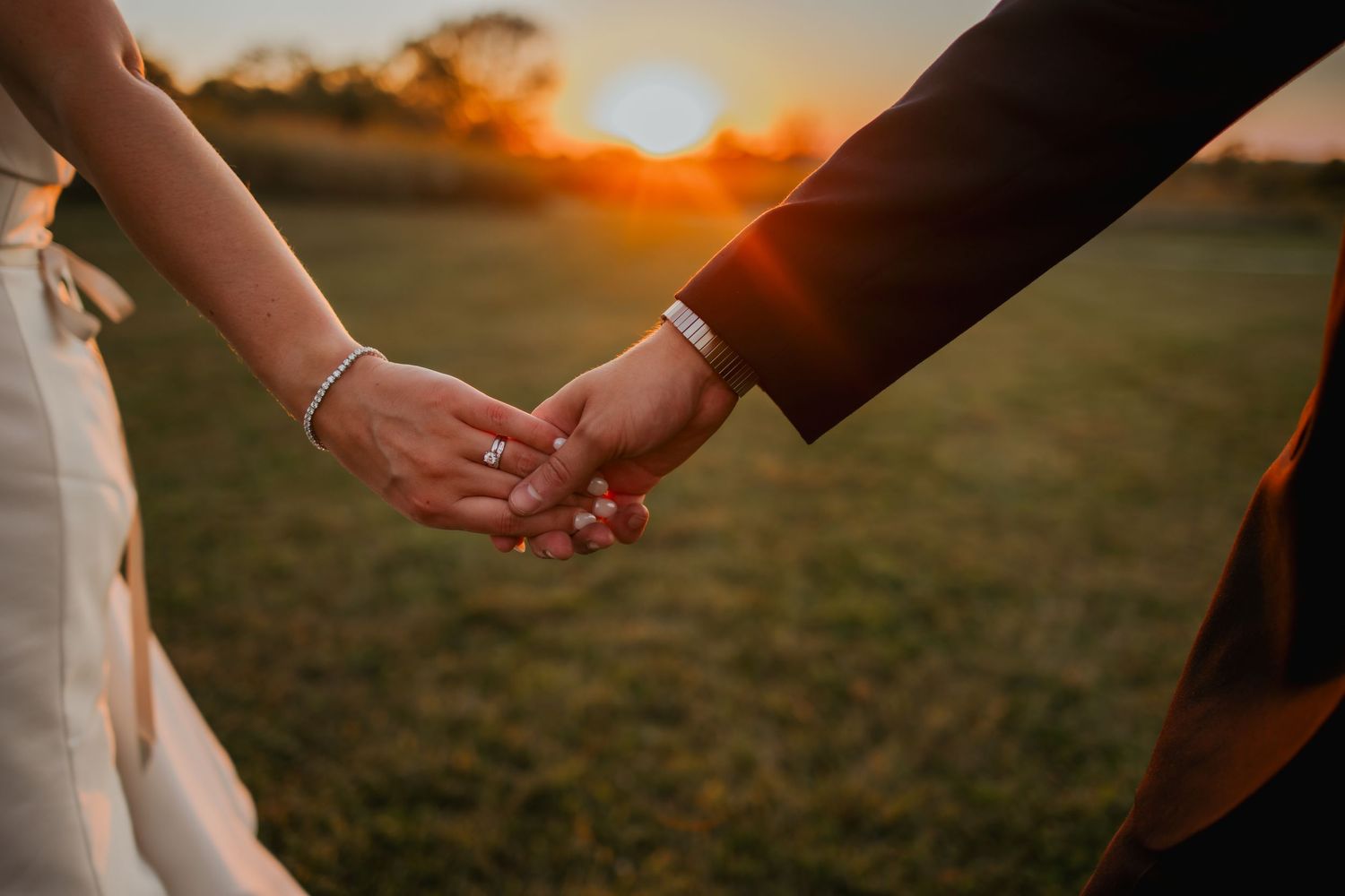 Bride and groom holding hands and Zionsville Indiana wedding