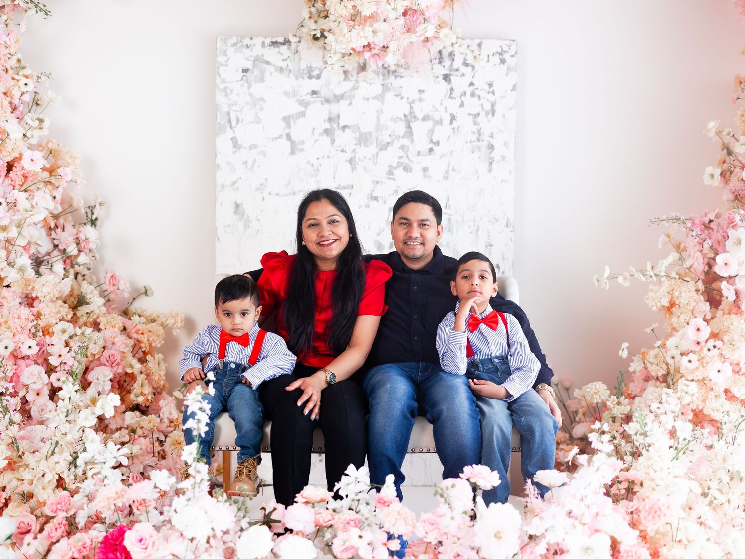 Valentine's Day mini sessions Extended family posing together in a beautiful outdoor location with fall foliage. Toronto family photography.