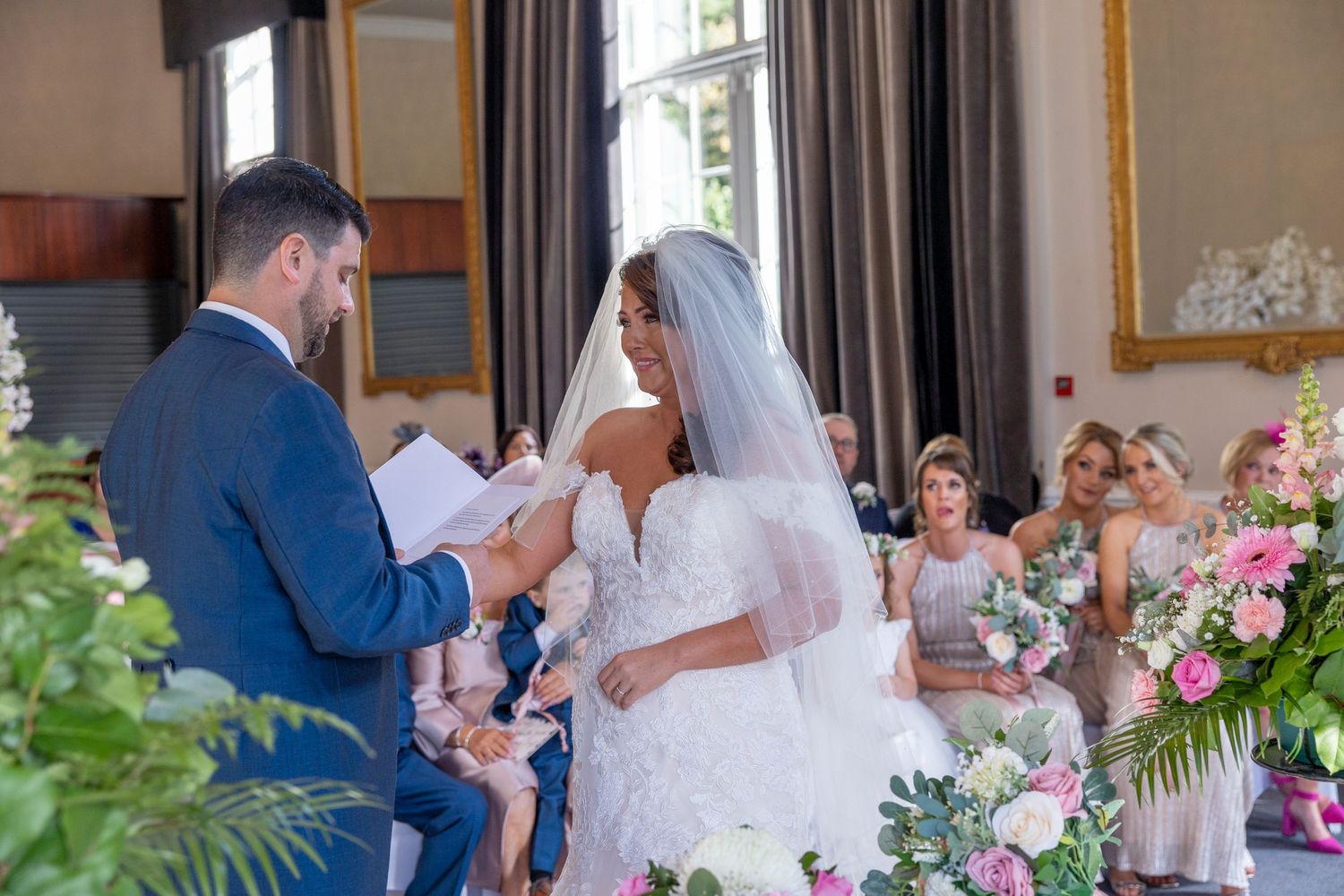 Time for the vows.  Photo by Casual Captures Wedding Photography