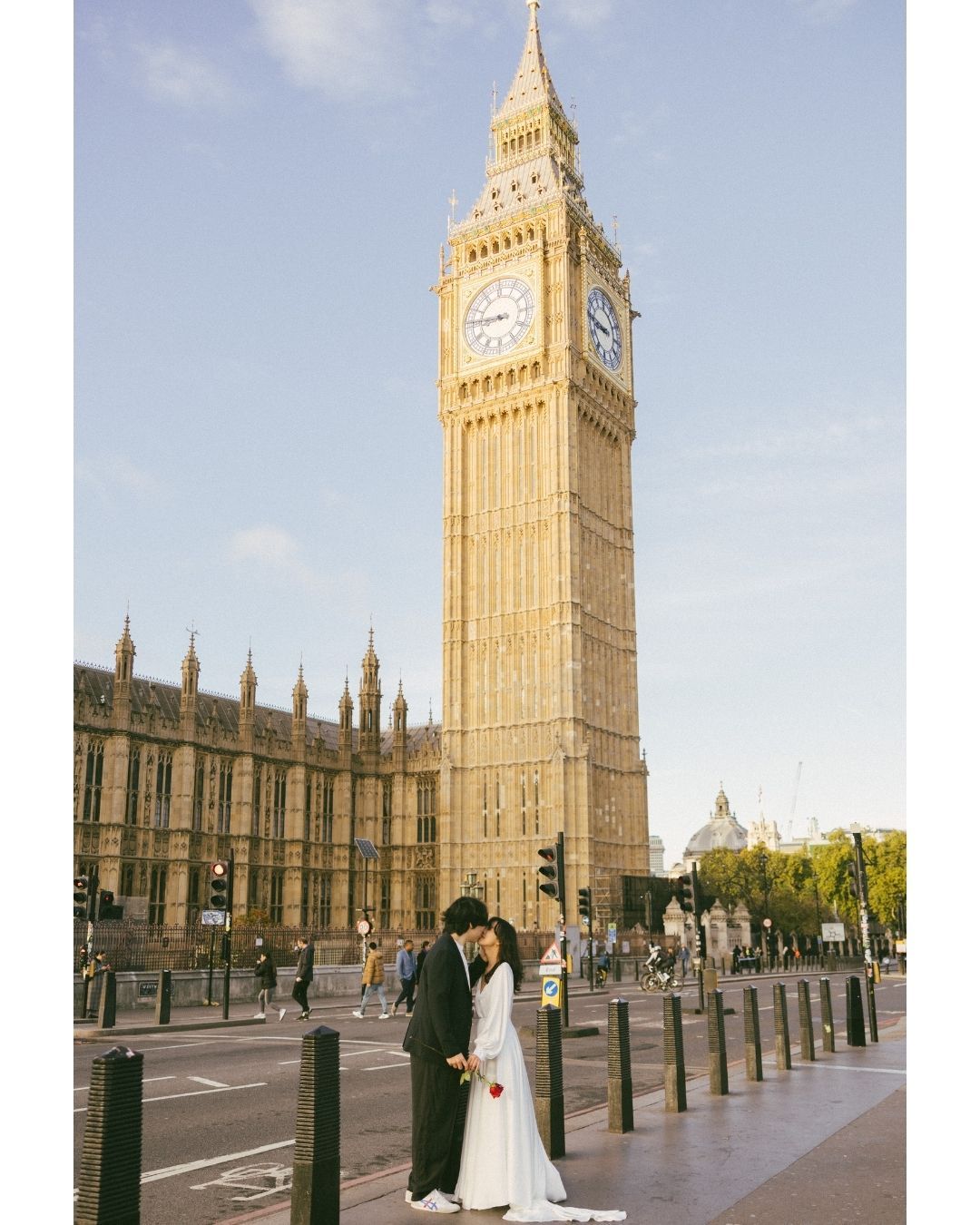 Stunning wedding couple at iconic Big Ben & Houses of Parliament, shot by a trusted wedding photographer in London