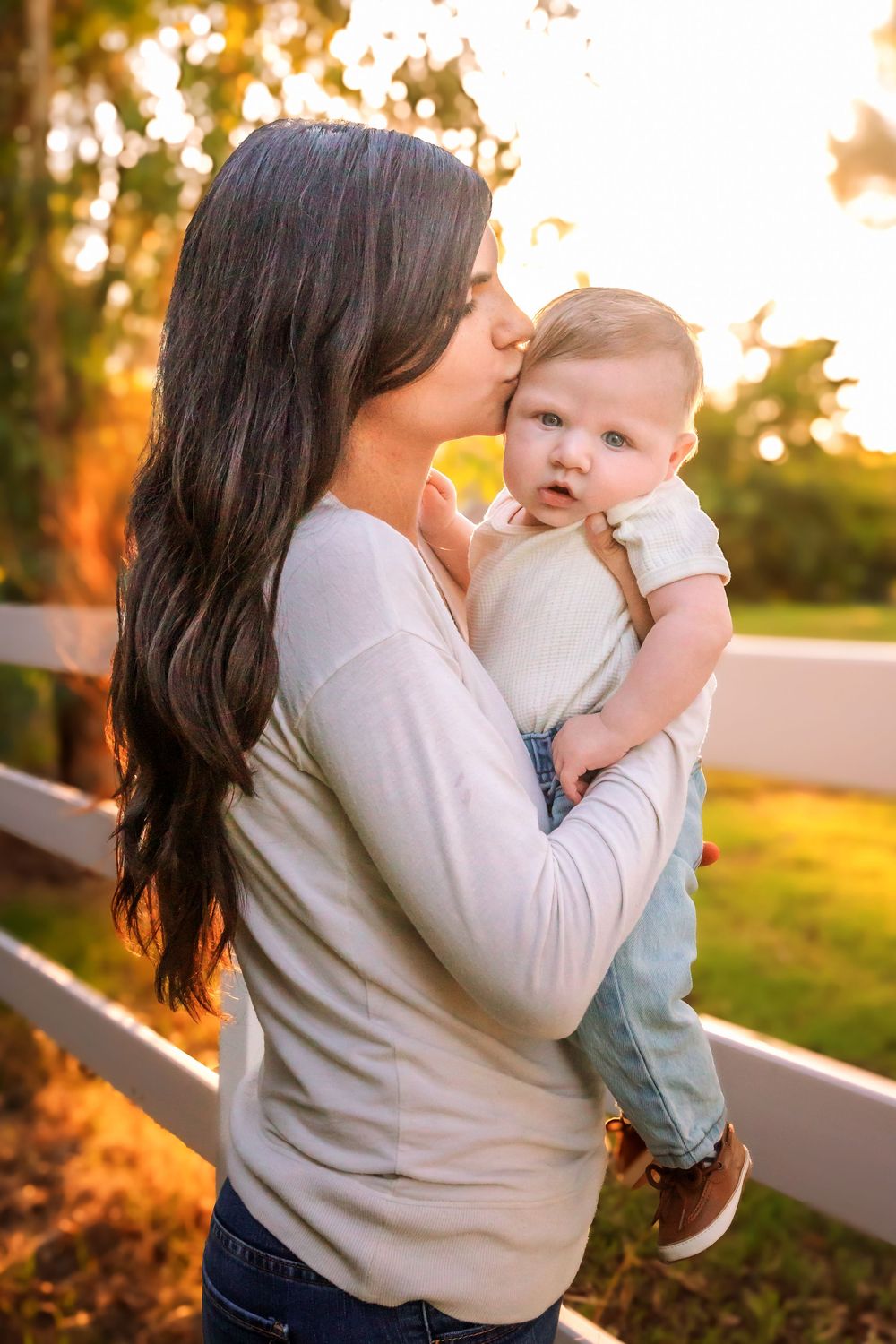 Lifestyle Fresno photographer capturing family memories in the heart of Clovis during fall.