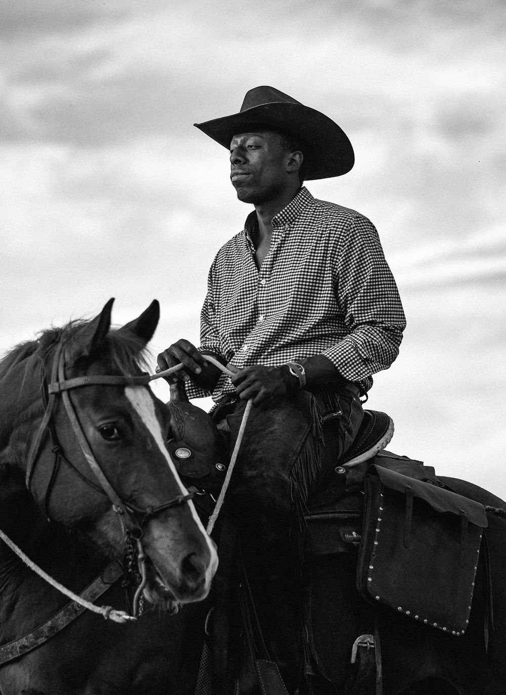 Black and white photo series of a cowboy riding horseback against a cloudy sky in western attire.