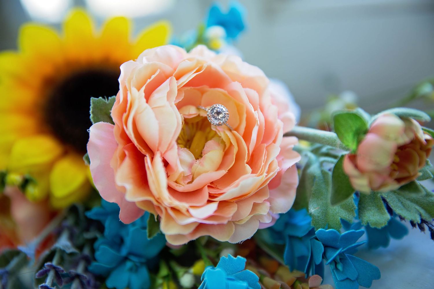 Wedding flowers with diamond ring