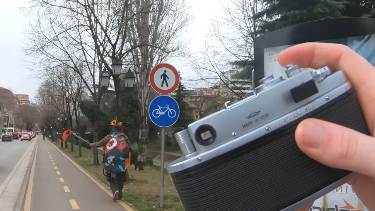 A collage of traffic signs, bike lanes, and navigation devices shows urban transportation infrastructure and technology.
