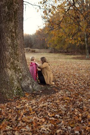 Memphis Family Portrait of toddler son and mother during Family session at Shelby Farms Memphis Tennessee during Golden Hour.
