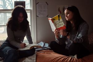 Memphis Family Portrait of sisters reading during Day in the Life session in Memphis Tennessee.